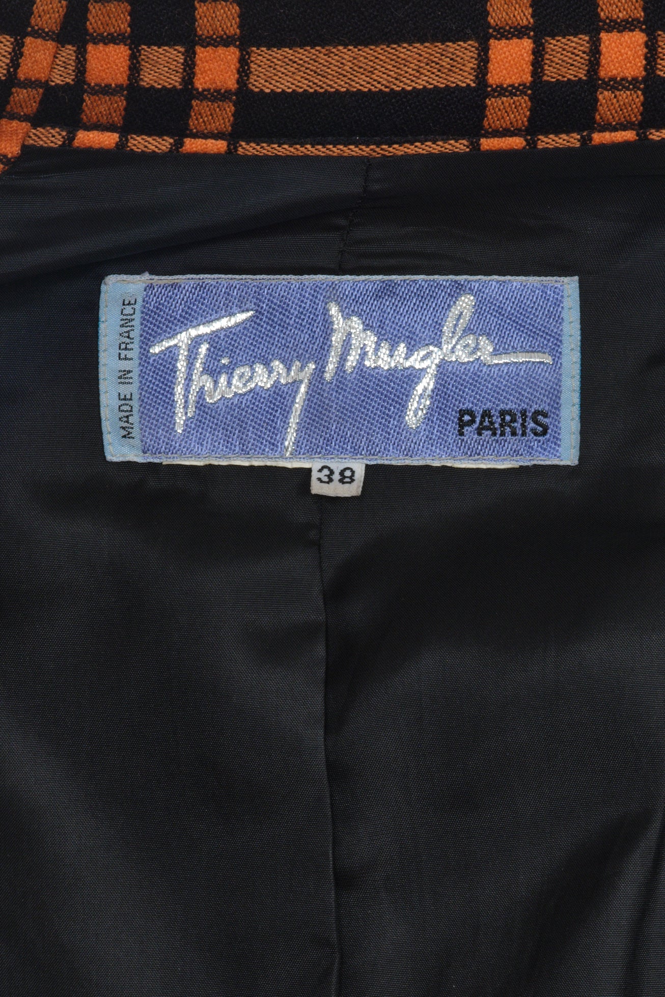 Thierry Mugler asymmetrical jacket from Fall Winter 1989 “Buick” collection